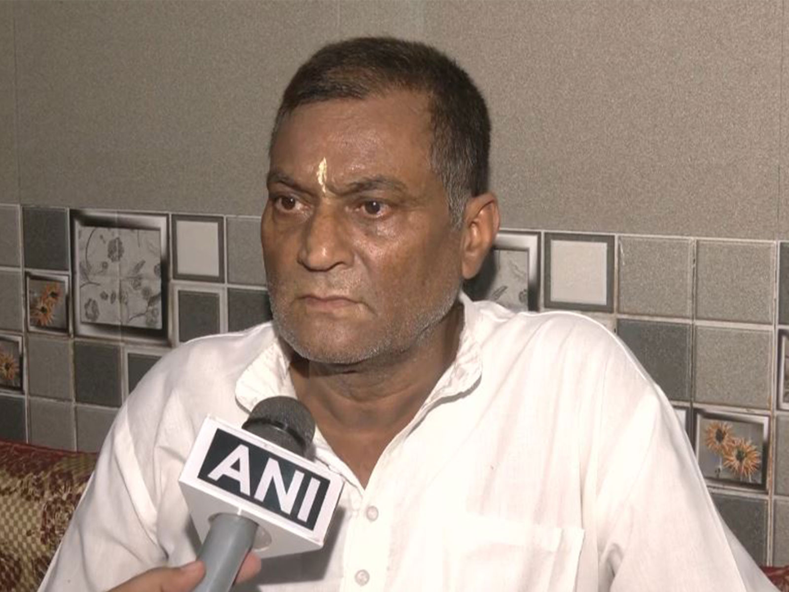 A relative of the 2003 Nadimarg massacre victim (Photo/ANI)