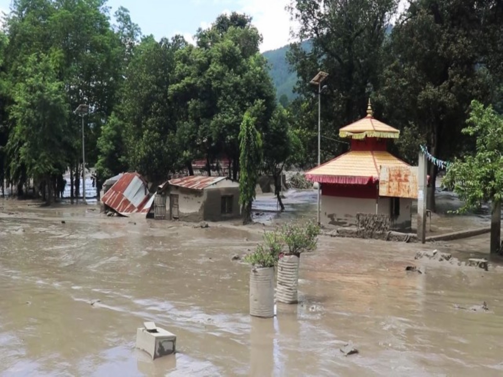 A view of an area submerged in mud-laden flash flood following an outburst in the Bhotekoshi River, in Nepal's Rasuwa (Photo/ANI)