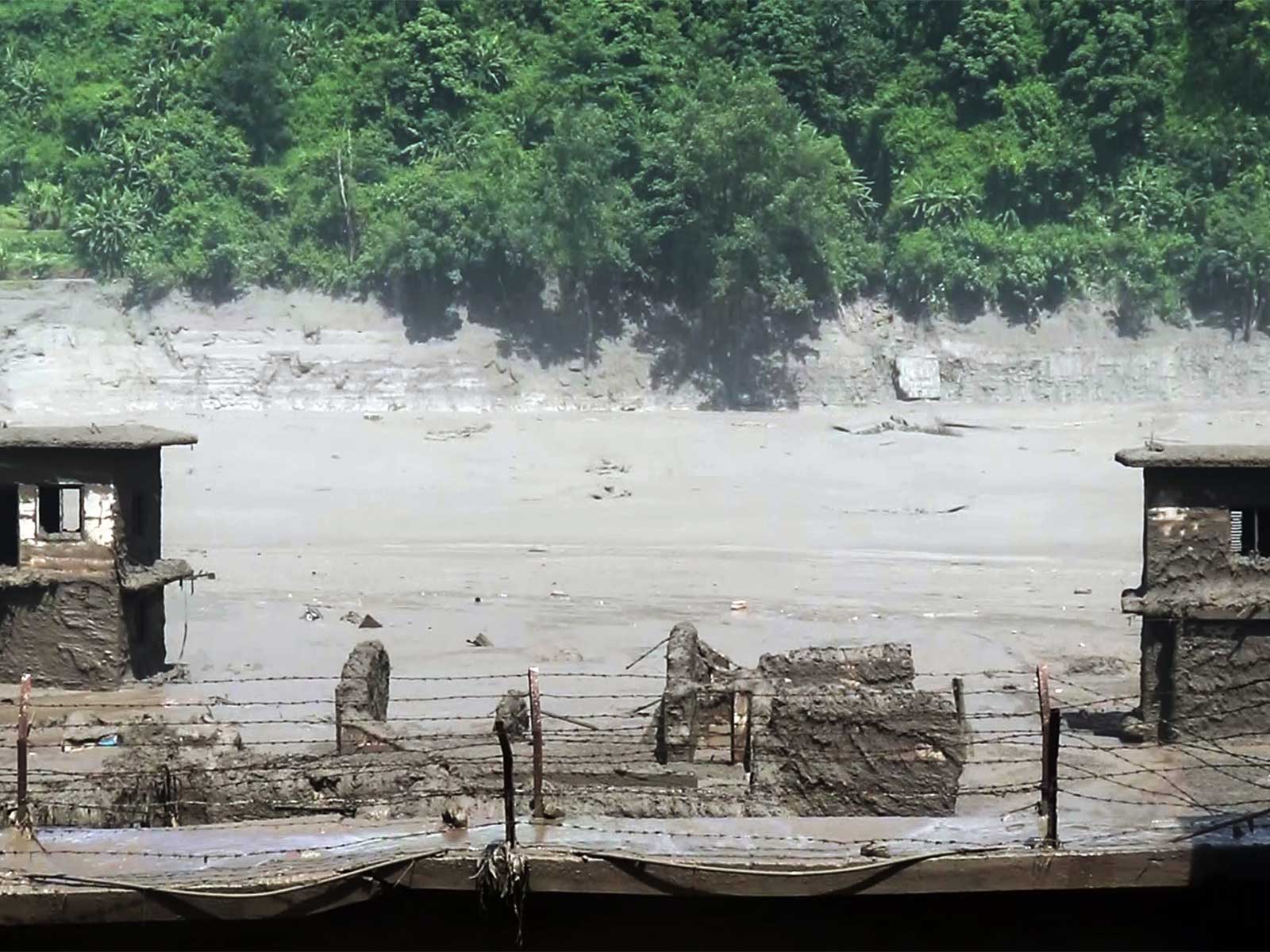 An area devastated by mud-laden floodwaters following a flash flood caused by an outburst in the Bhotekoshi River, in Nepal's Rasuwa (Photo/ANI)