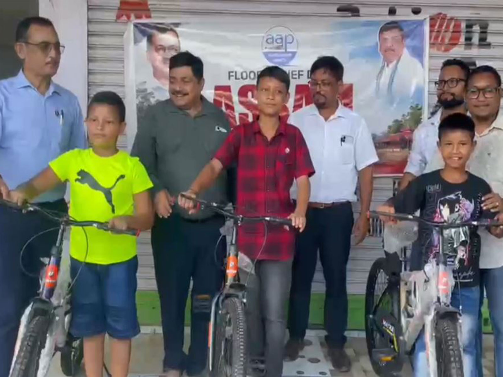 Flood-hit students receive bicycles in Assam (Photo/ANI)