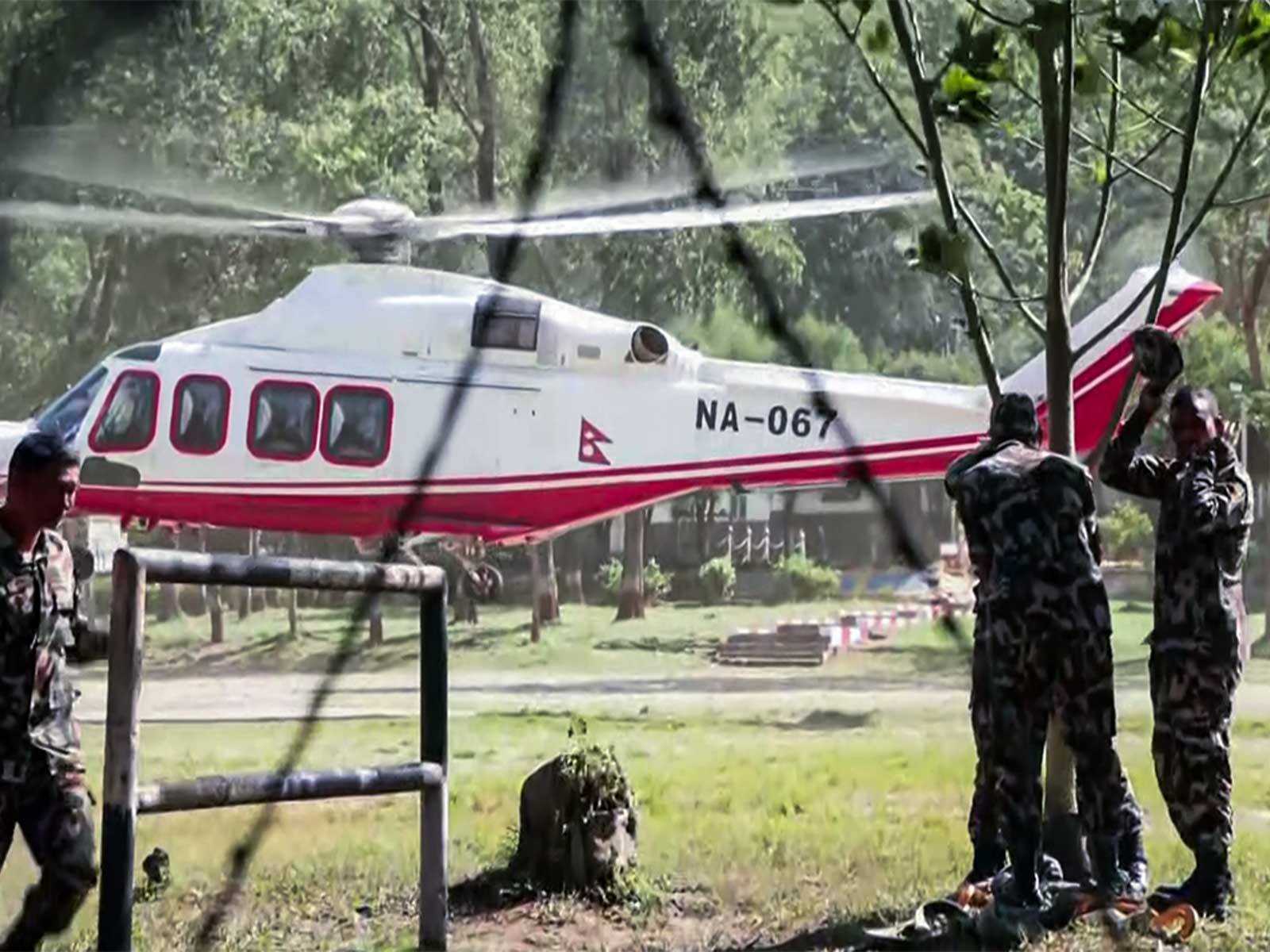 Rescue team members conduct a rescue operation in Nuwakot (Photo/ANI)