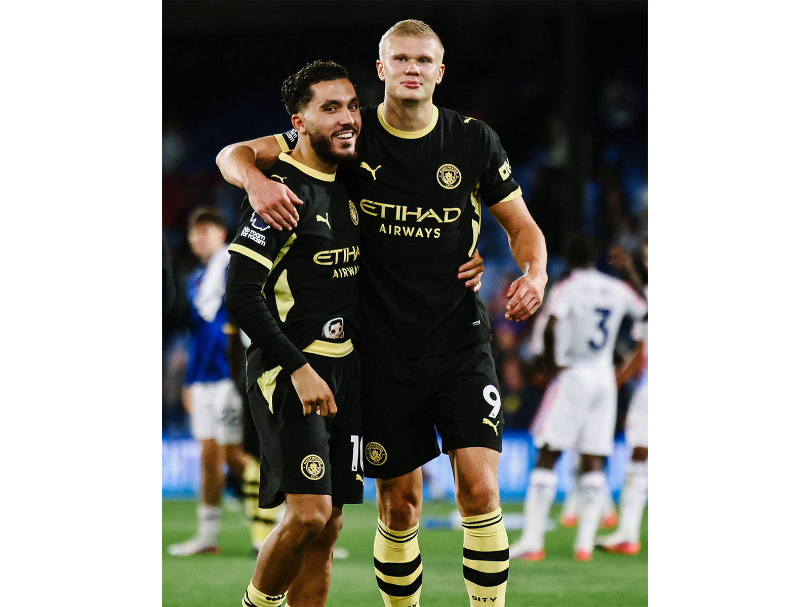 Rayan Cherki (L) and Erling Haaland celebrating (Photo: X/@ManCity)
