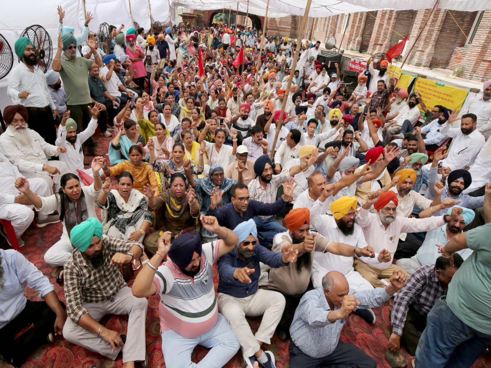 Punjab government employees and pensioners hold a statewide strike outside the Deputy Commissioner's office on August 27, 2026 (Photo:ANI)