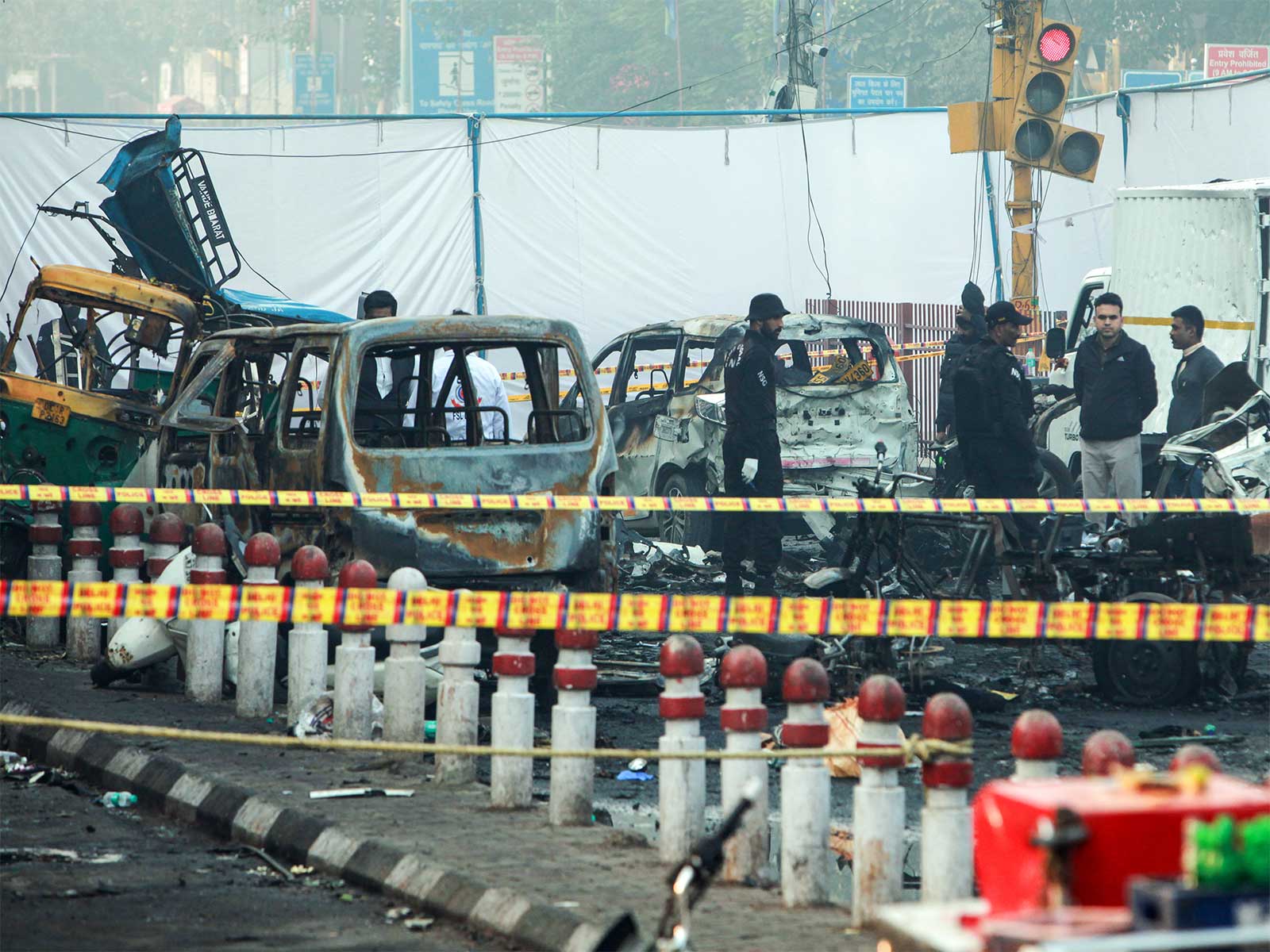 NSG team investigate the spot of the blast in a car near Gate no 1 of the Red Fort Metro station (File photo/ANI)