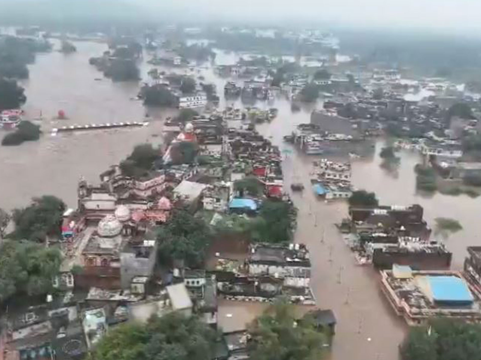 An aerial view captured by a drone camera shows the rising water levels of the Mandakini River at Ram Ghat. (Photo/@chitrakootpol)