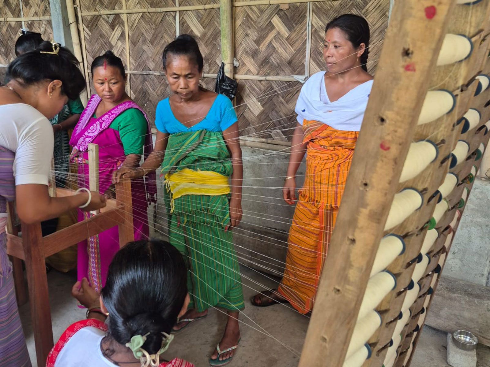 Women handloom weavers participate in a training programme on warping drum technology organised by Aaranyak (Photo/ANI)