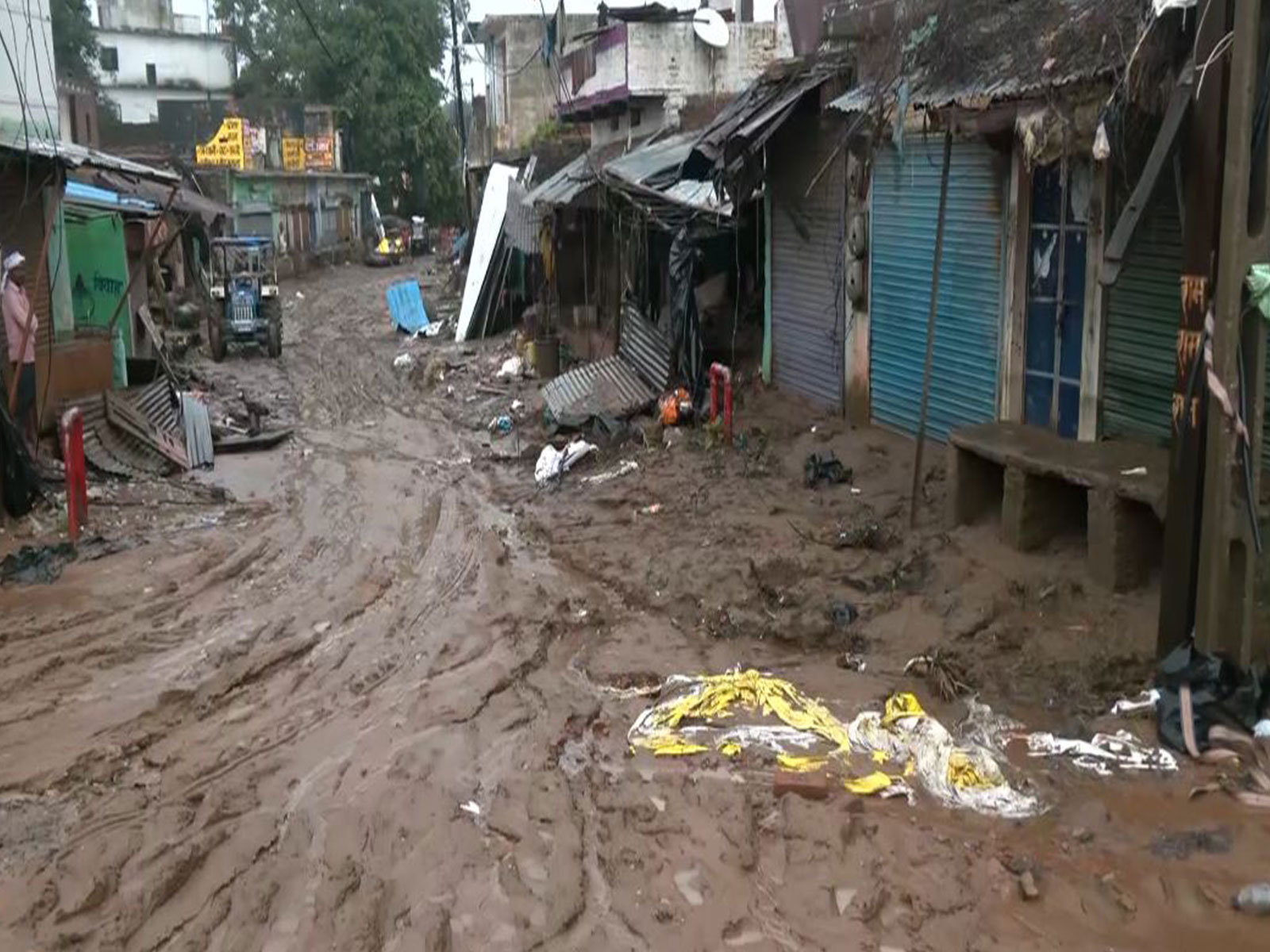 Flood aftermath visuals from Chitrakoot show mud-covered streets and damaged areas (Photo/ANI)