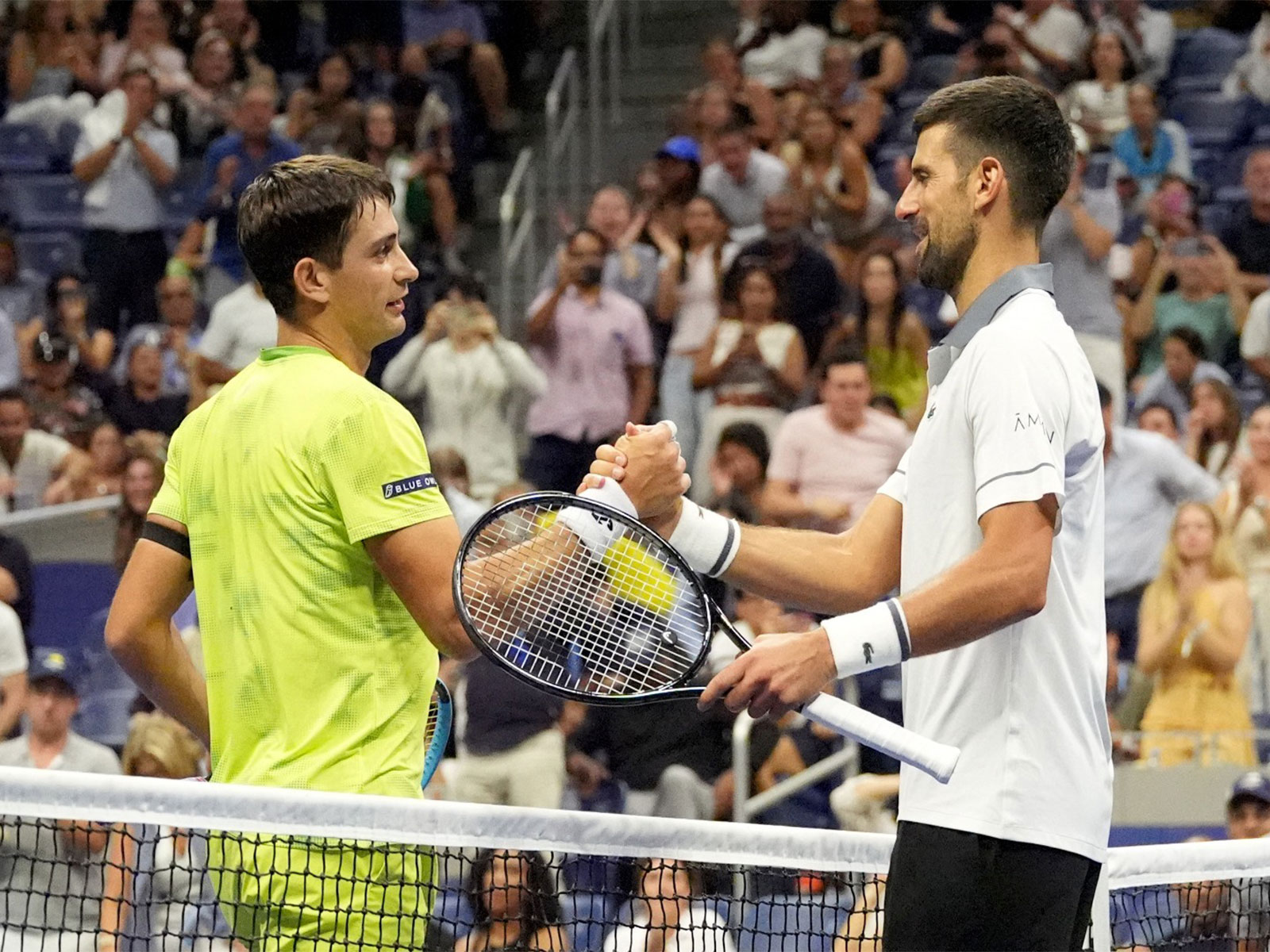Argentina's Mariano Navone shakes hands with Serbia's Novak Djokovic after winning his first round match at US Open 2026. (Photo: IMAGN IMAGES via Reuters)