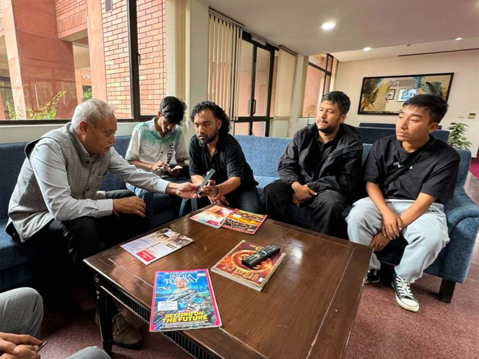 India's Ambassador to Nepal Naveen Srivastava meets three Indian nationals rescued from flash flood-hit Chilime village in Nepal's Rasuwa district (Photo/X/@navsri6619)