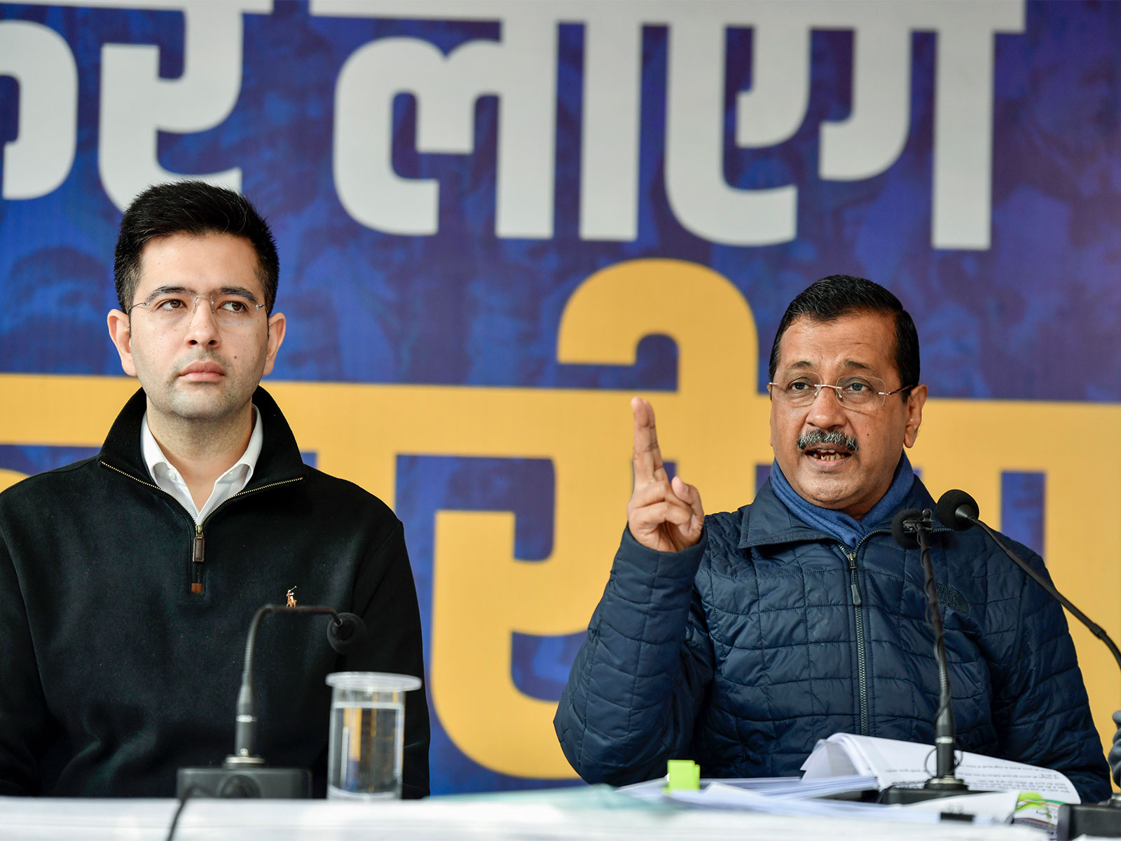 BJP Rajya Sabha MP Raghav Chadha (L) and AAP National Convenor Arvind Kejriwal (R) (Photo/ANI)