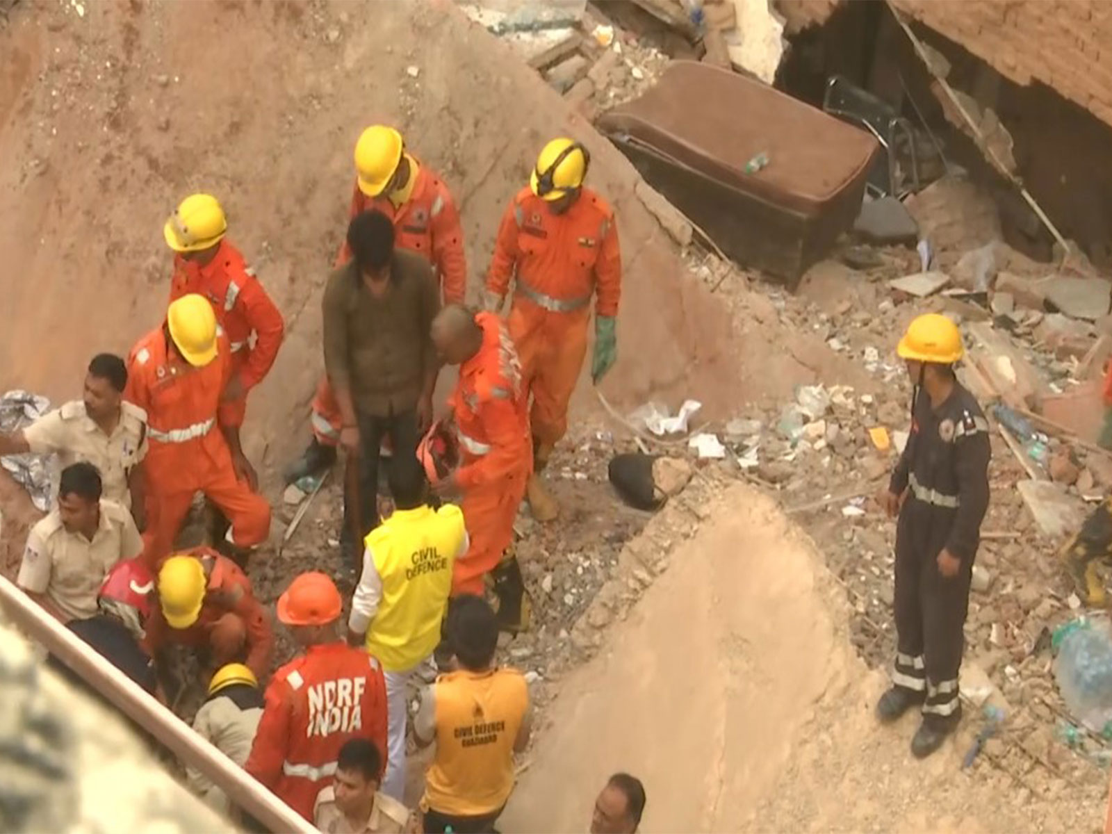 Rescue operations continue after a building collapsed near Satya Niketan (Photo/ANI)