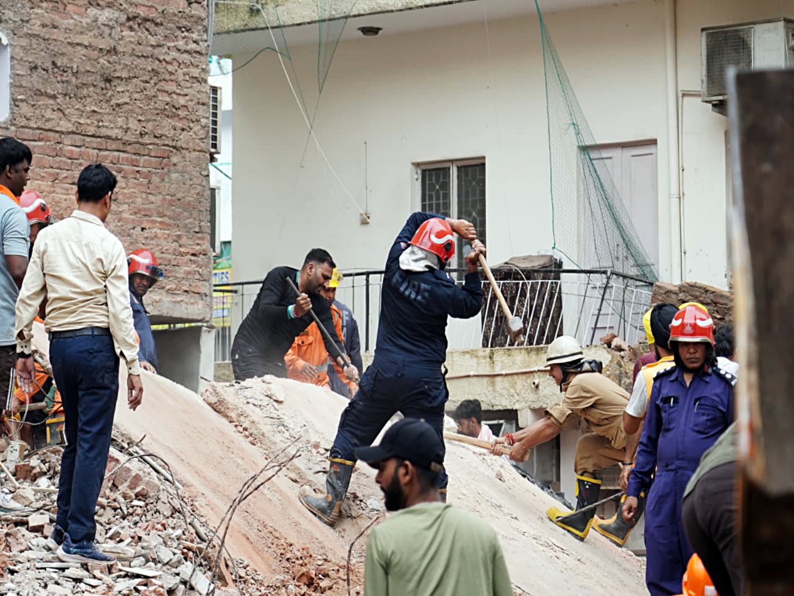 Search and rescue operations are undergoing at the building collapse site (Photo/ANI)