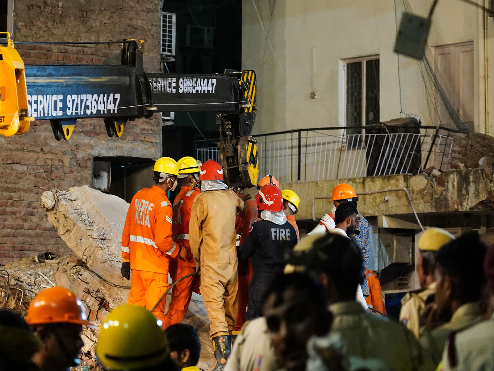 Rescue operations underway at the site of a building collapse at Satya Niketan in South-West Delhi (Photo/ANI)