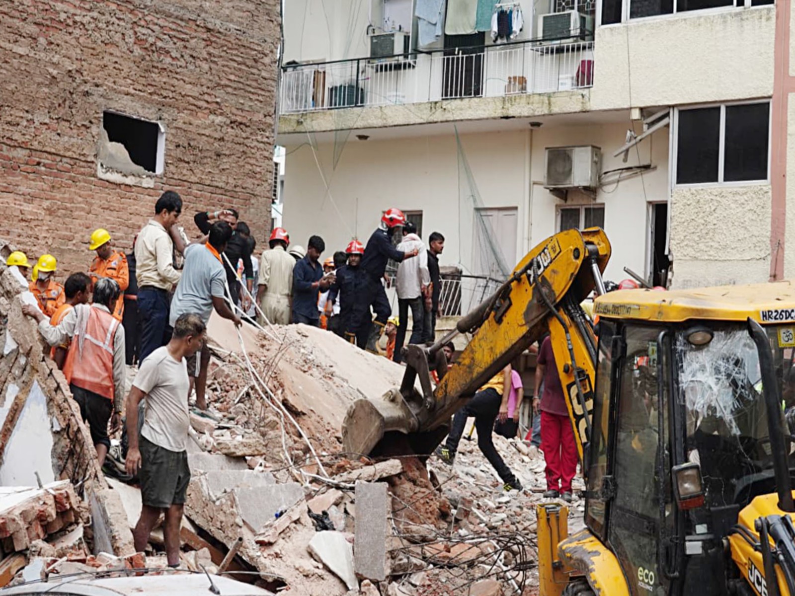 Rescue operations underway at the Satya Niketan building collapse site (Photo/ANI)