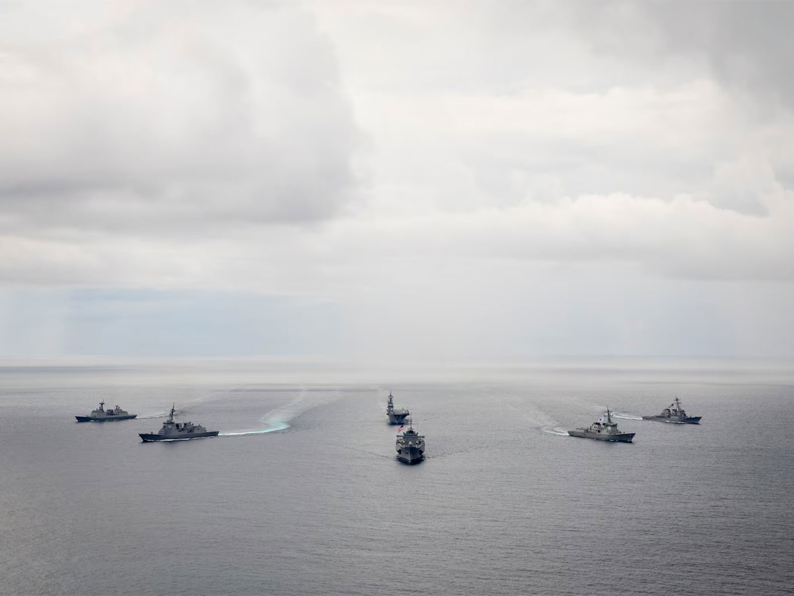 Naval vessels from the United States, South Korea, and Japan participate in the trilateral "Freedom Edge" joint military exercise in international waters. (Image Source: Commander, US 7th Fleet)