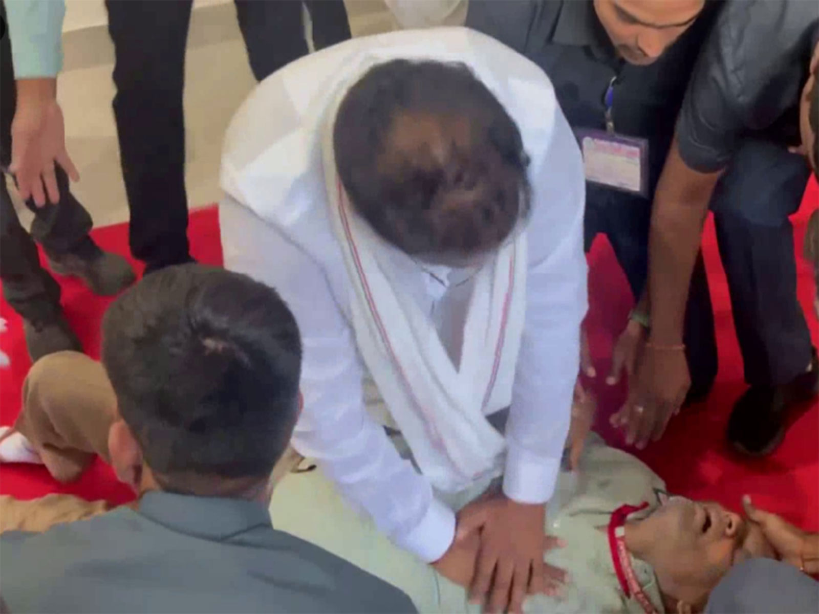 Telangana Minister Vakiti Srihari performs CPR on IAS Officer's PS after he collapses at assembly (Photo: Congress PRO)