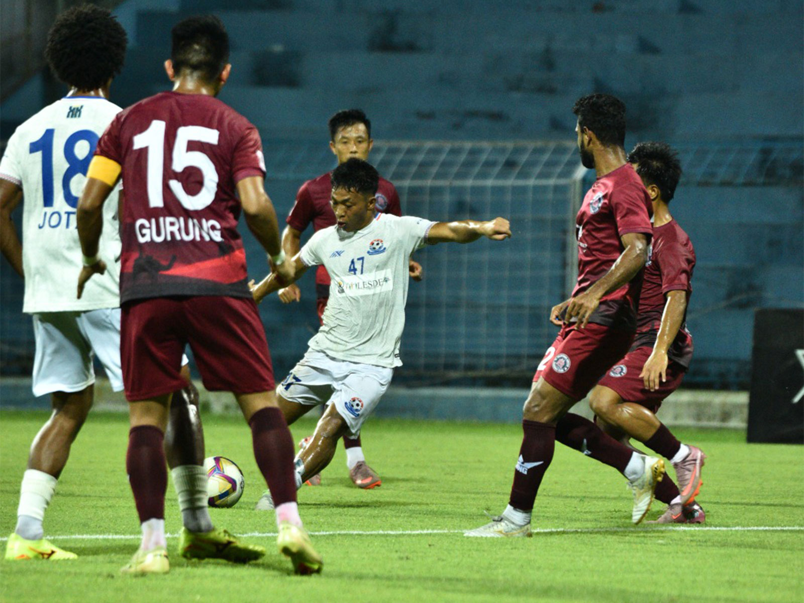 Chanmari FC and Rajasthan United players in action during an IFL 2025-26 Championship Phase fixture. (Photo: AIFF Media)