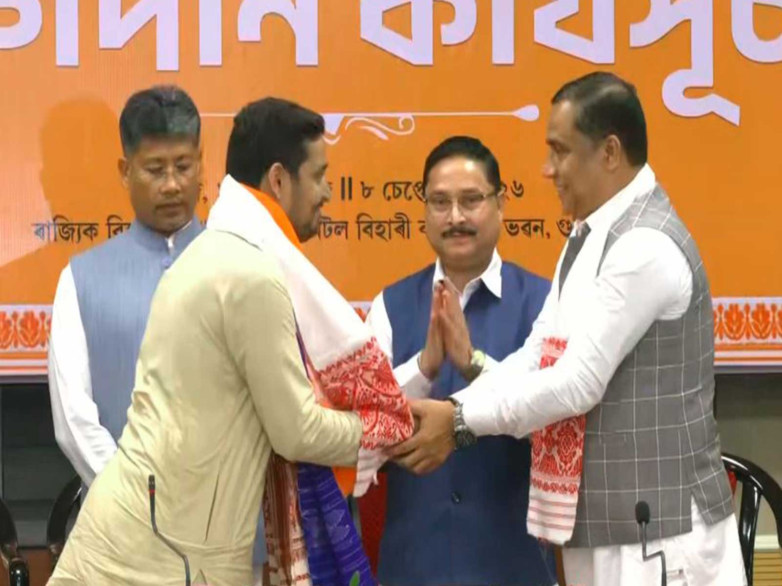 Former Nagaon DC Debashis Sarma, journalists Lenin Saurav Bora, Gunjan Kalita join BJP in Assam (Photo/ANI)