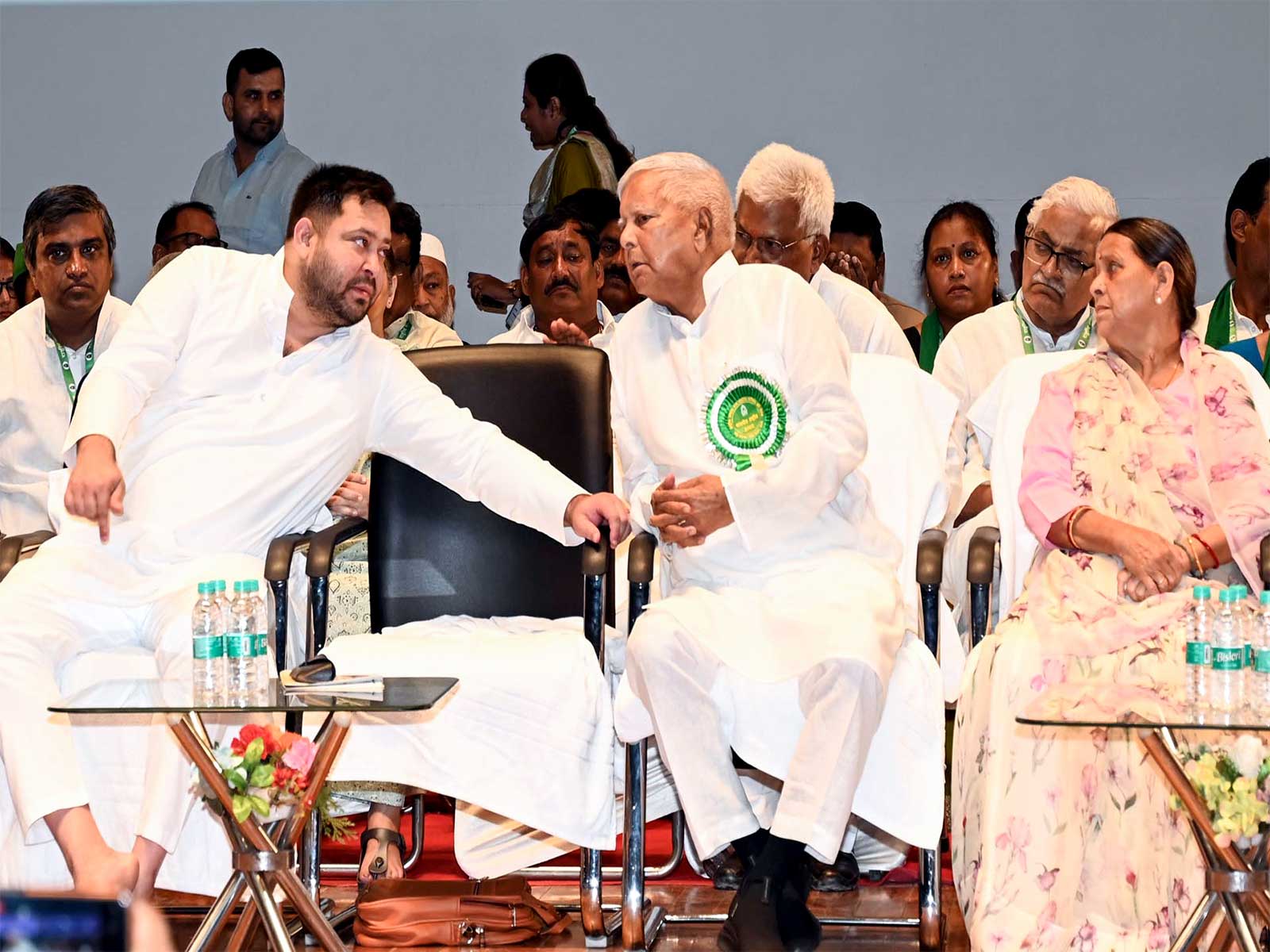 RJD chief Lalu Prasad Yadav with party leaders Tejashwi Yadav and Rabri Devi (File Photo/ANI)