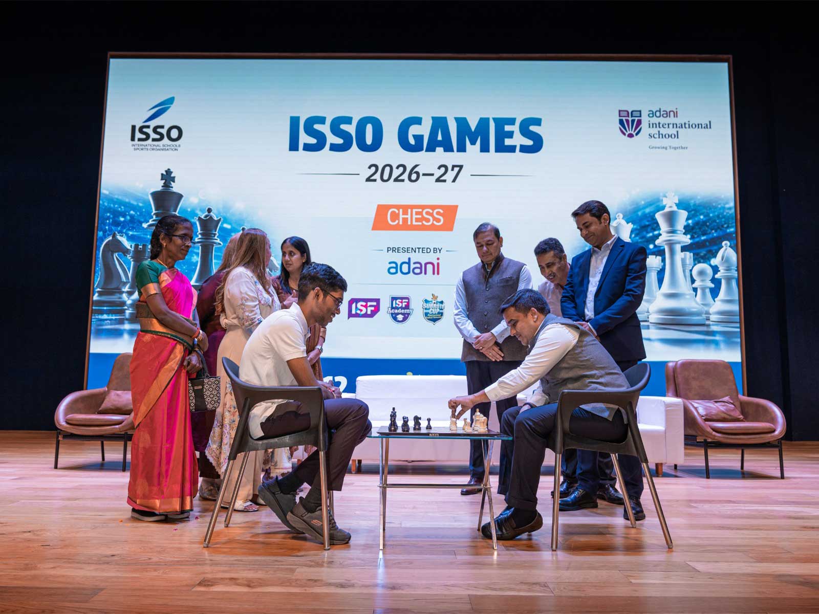 Praggnanandhaa (L) and Gujarat Deputy Chief Minister Harsh Sanghavi (R) attend the ISSO Chess Games 2026-27 at Adani International School. (Photo: ISSO)