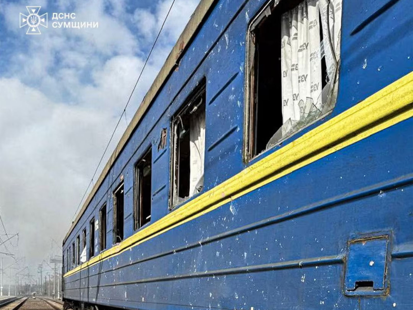 Train carriage damaged in a Russian drone strike remains on the tracks at the railway station. (Photo/Reuters)