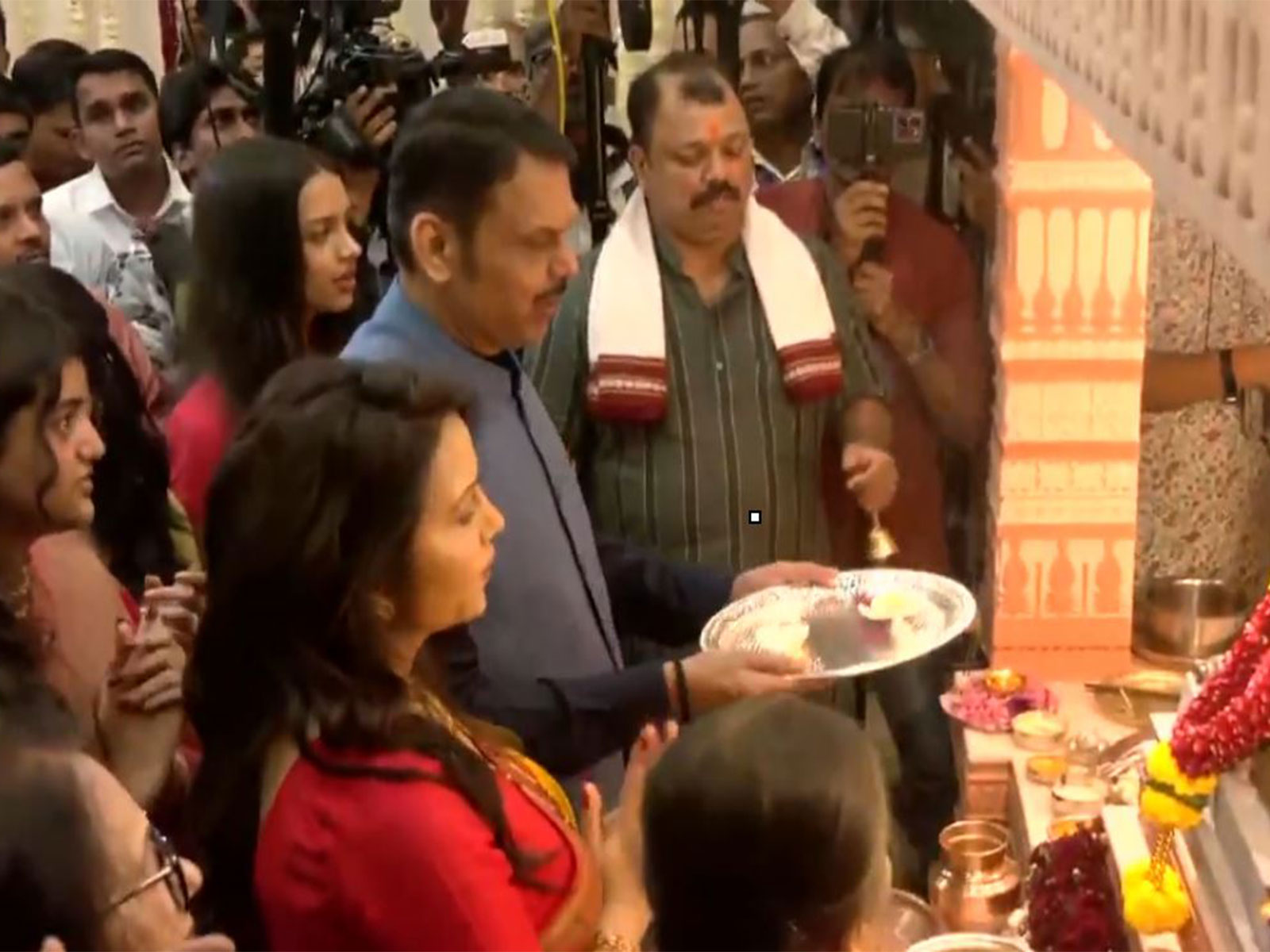 Maharashtra CM Devendra Fadnavis, along with his wife Amruta Fadnavis, performs aarti on Ganesh Chaturthi (Photo/ANI)