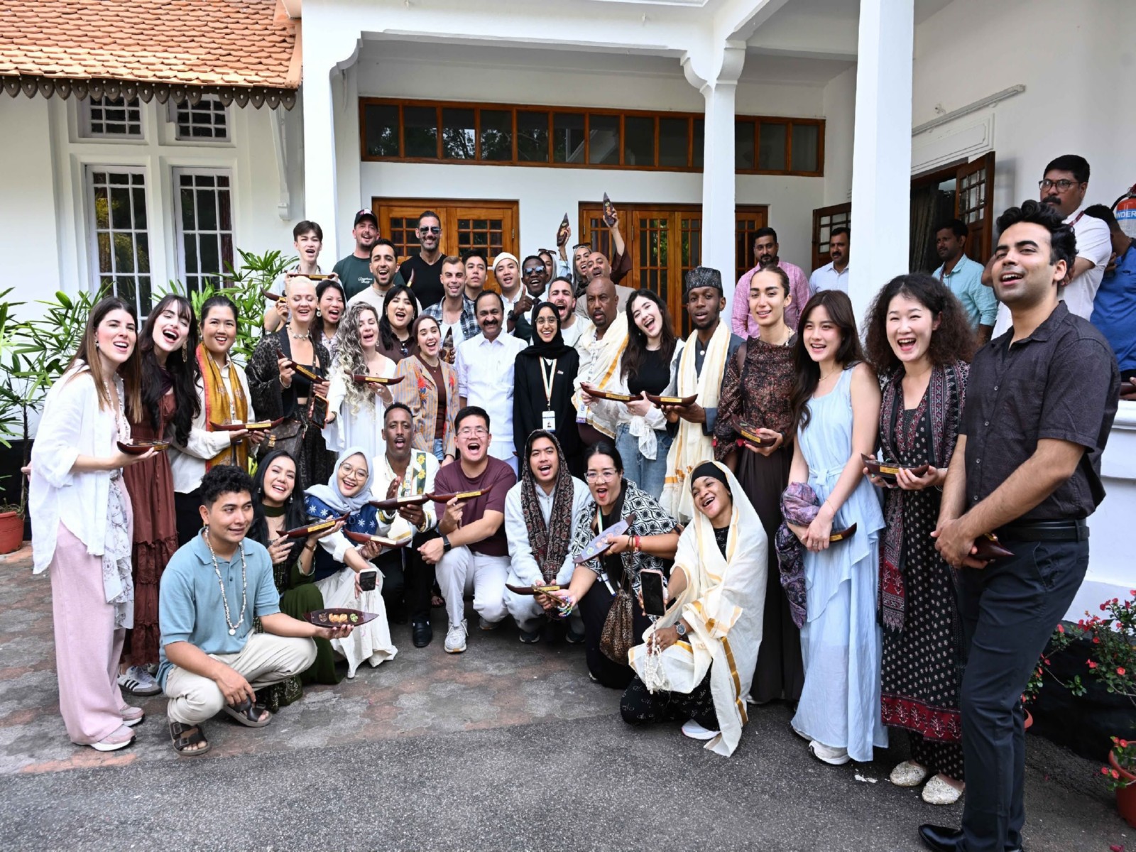 Keralam CM VD Satheesan with 35 BRICS content creators (Photo/X/@vdsatheesan)