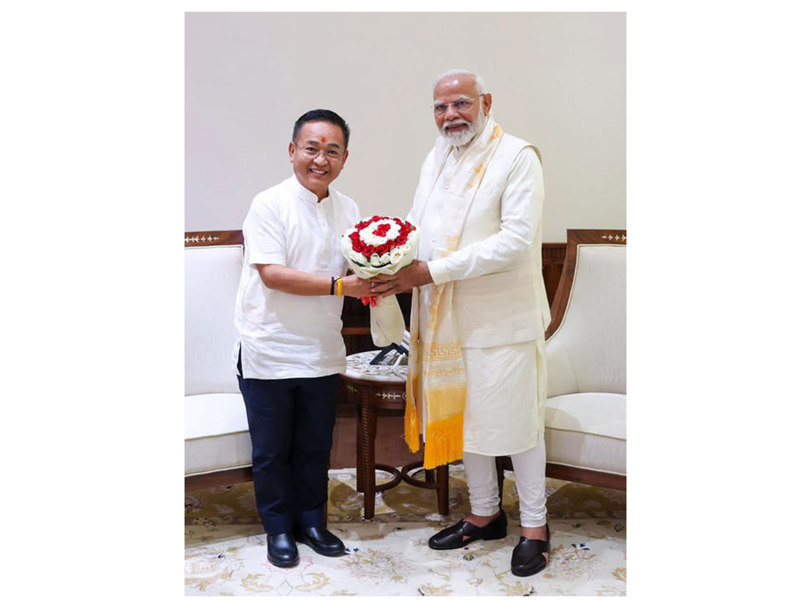 Prime Minister Modi with  Sikkim Chief Minister Prem Singh Tamang (Photo/SikkimCMO)