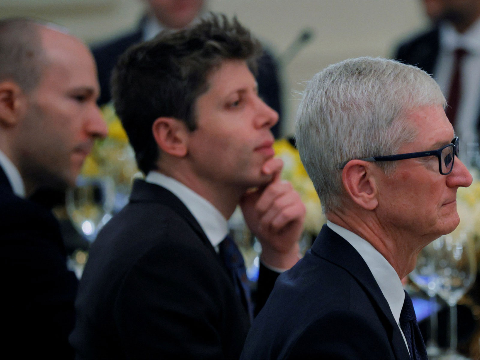 Sam Altman, CEO of OpenAI Inc., left, and Tim Cook, former CEO of Apple Inc., during a dinner with tech leaders in the State Dining Room of the White House on September 4, 2025 (File Photo/Reuters)
