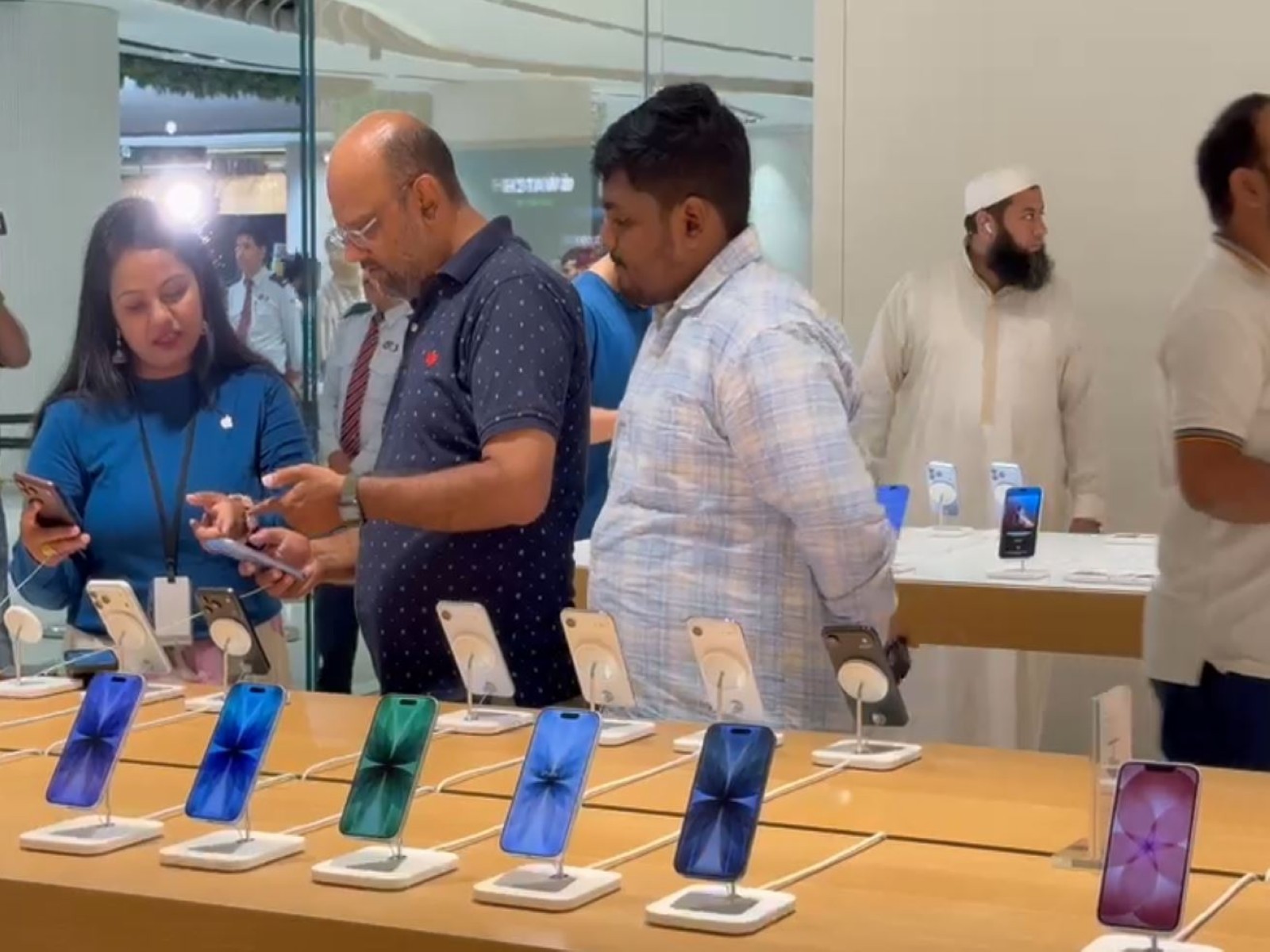 Customers at an Apple store in Bengaluru (Photo/ANI)