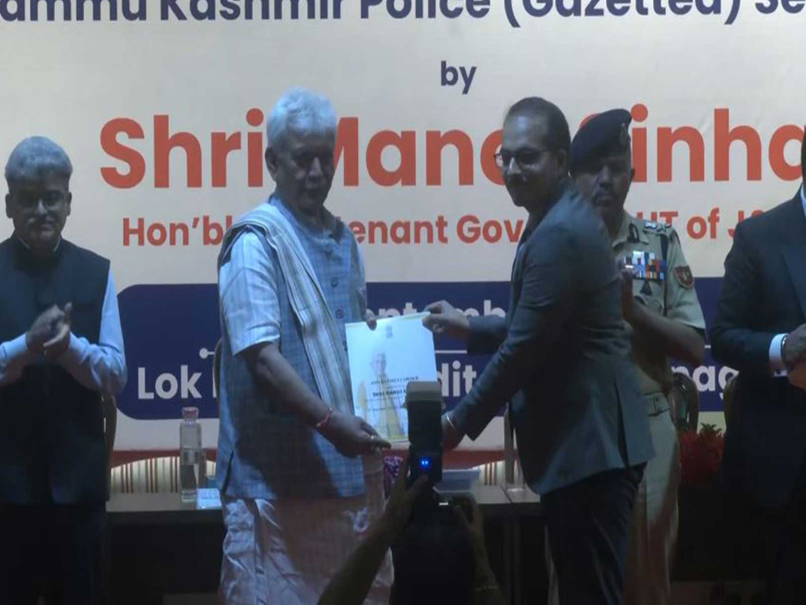 Jammu and Kashmir Lieutenant Governor Manoj Sinha handing appointment orders(Photo/ANI)