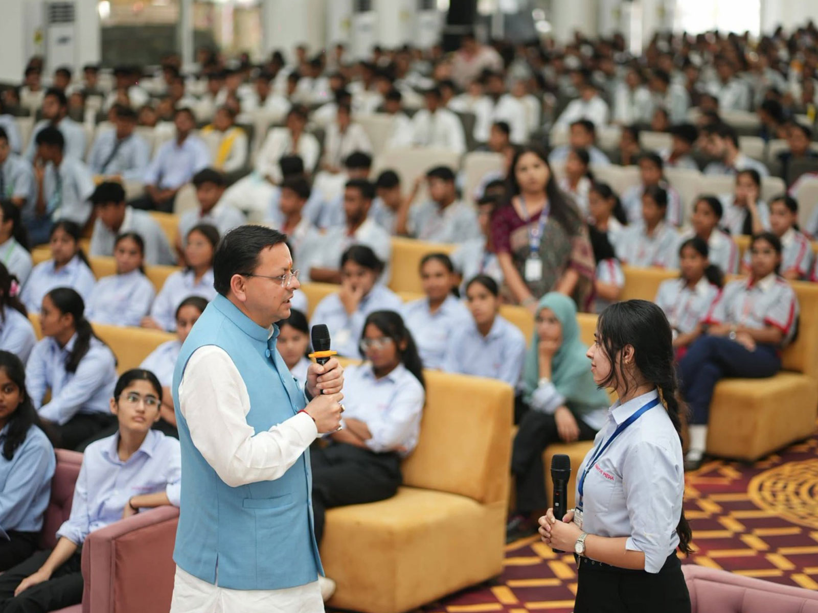 Pushkar singh Dhami interacting with students at Kashipur (Photo/ANI)