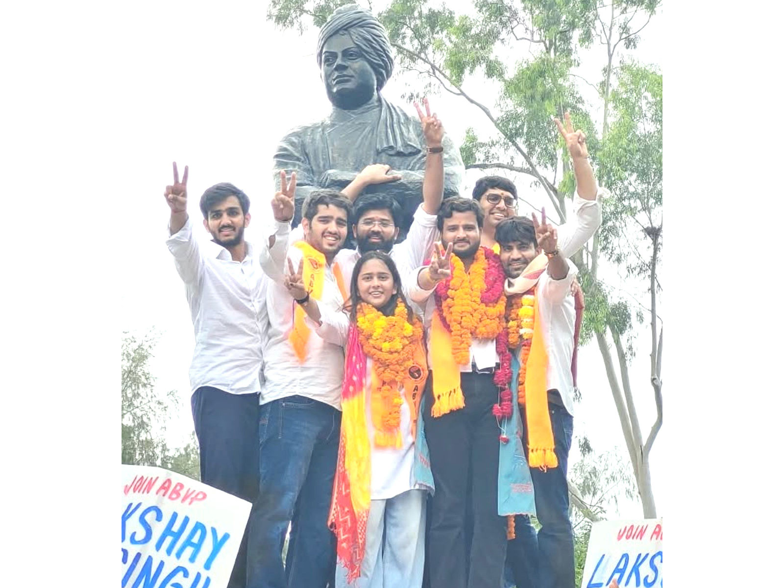 ABVP candidates celebrating their victory at the Swami Vivekananda statue inside the Arts Faculty campus after the DUSU results (Photo/@NitinNabin)