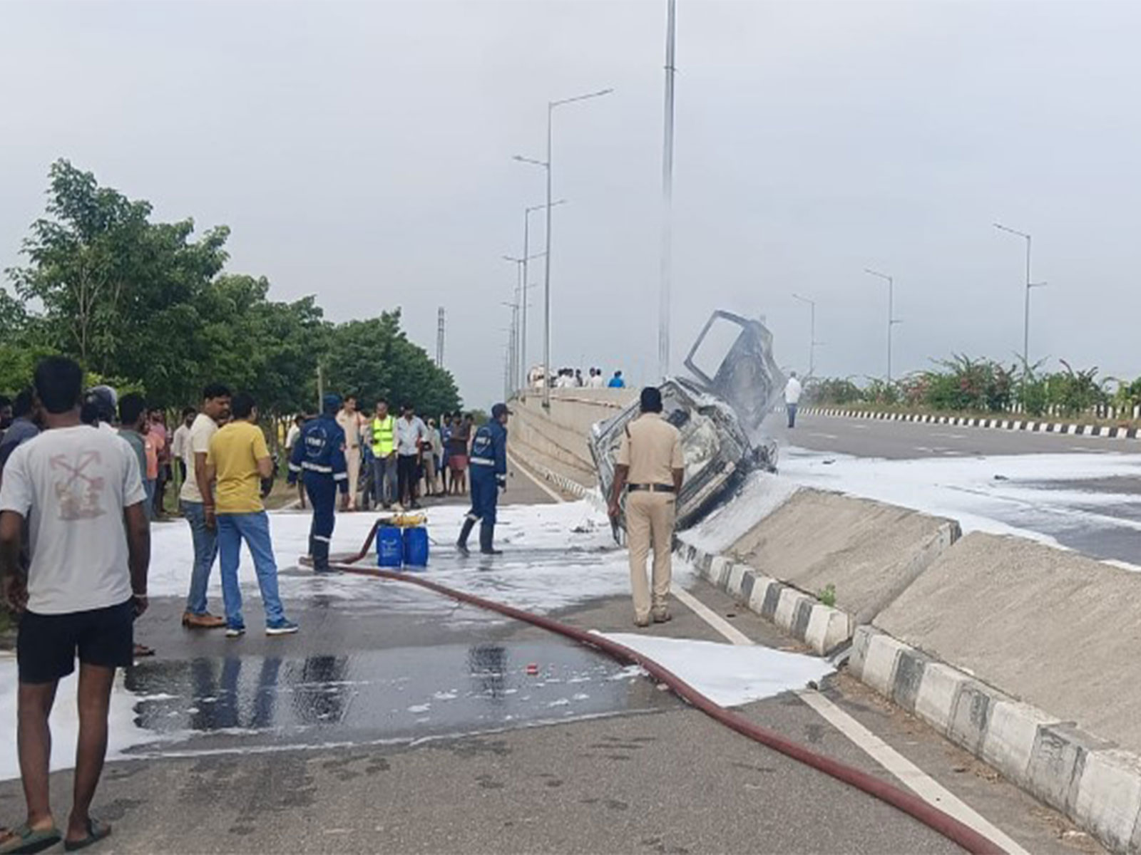 Car rams divider at National Highway 365 in Suryapet (Photo/Fire offical)