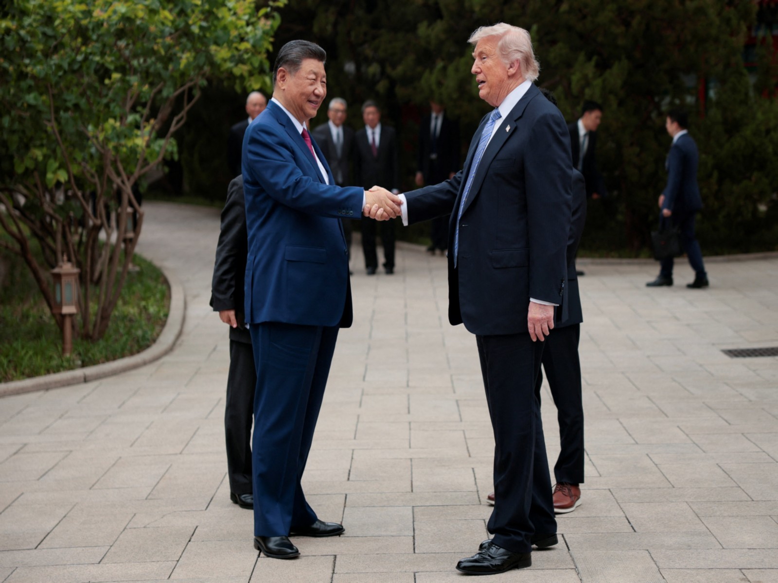 Chinese President Xi Jinping (L) and US President Donald Trump (R) (File Photo/Reuters)