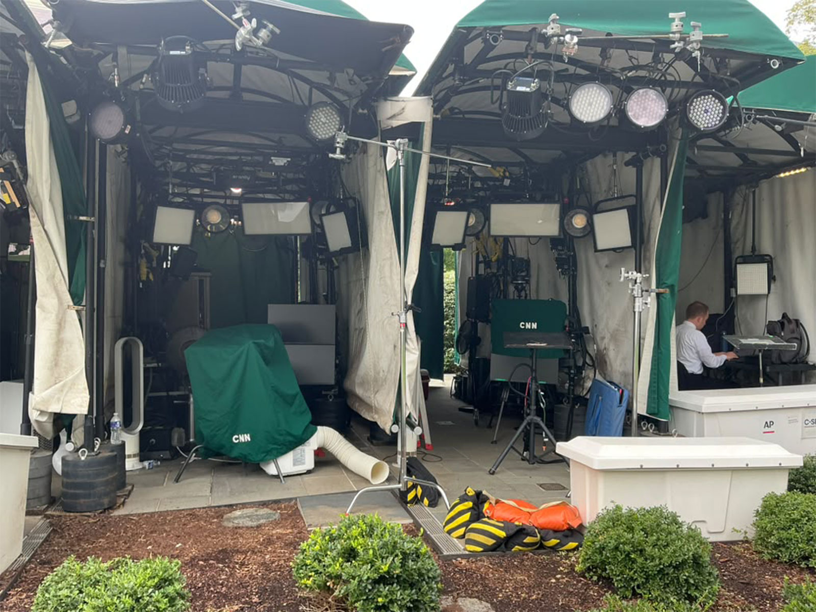 CNN's broadcast booth on the White House grounds stands vacant with equipment covered after US President Donald trump revoked the network's media access (Photo/ANI)