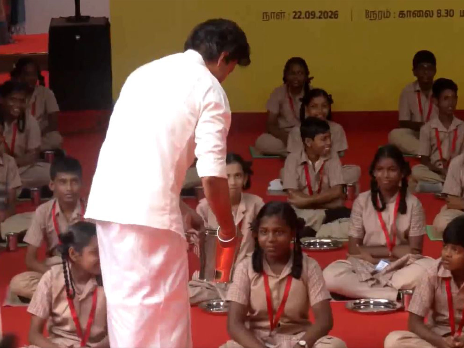 Tamil Nadu Chief Minister C Joseph Vijay distributes breakfast to schoolchildren during the launch of the expanded Perunthalaivar Kamarajar Free Breakfast Scheme at Government Middle School in Gandhi Gramam, Thiruvanmiyur, Chennai. (Photo: ANI)