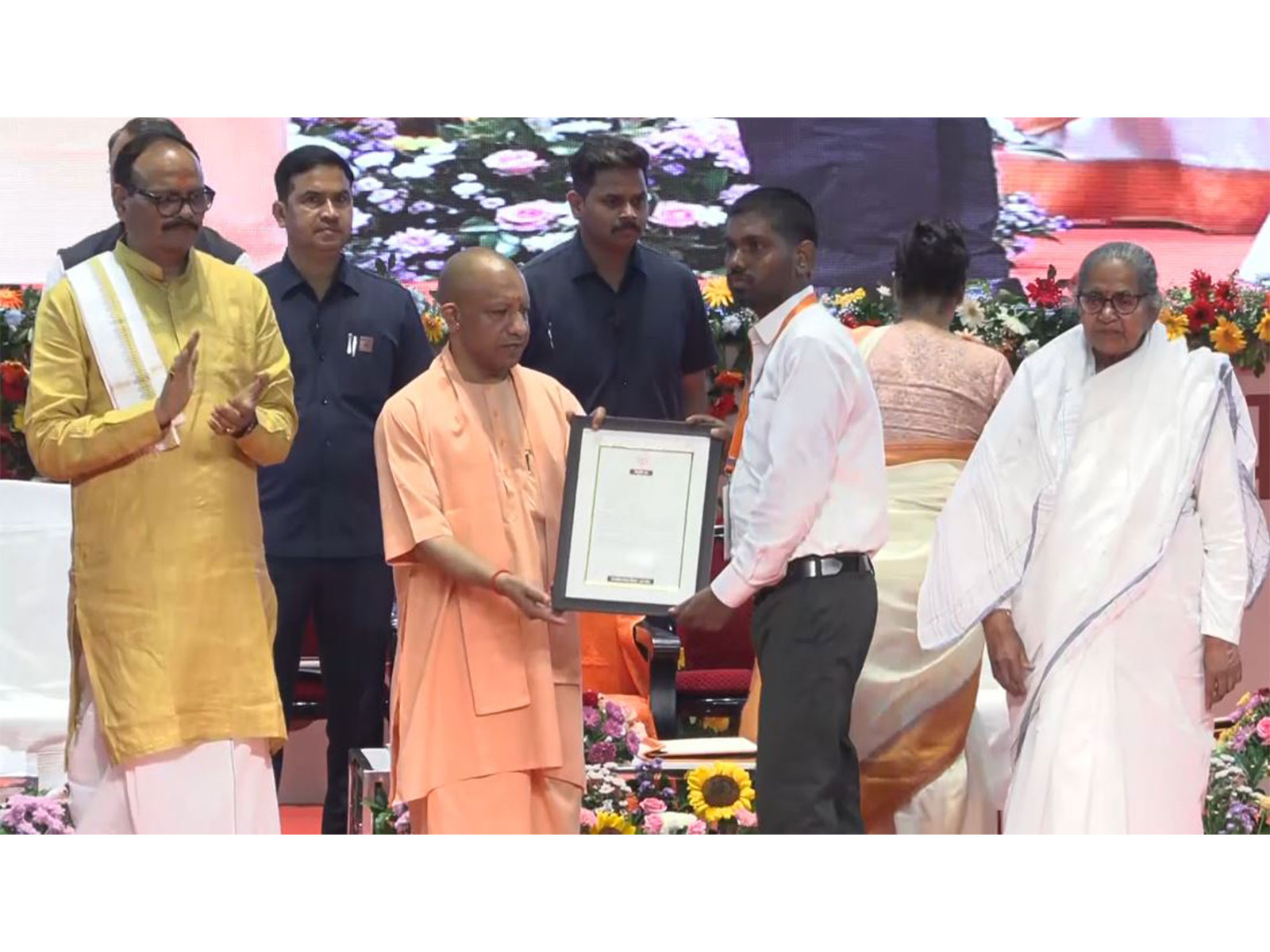 Yogi Adityanath gives appointment letter to candidates (Photo/ANI) 
