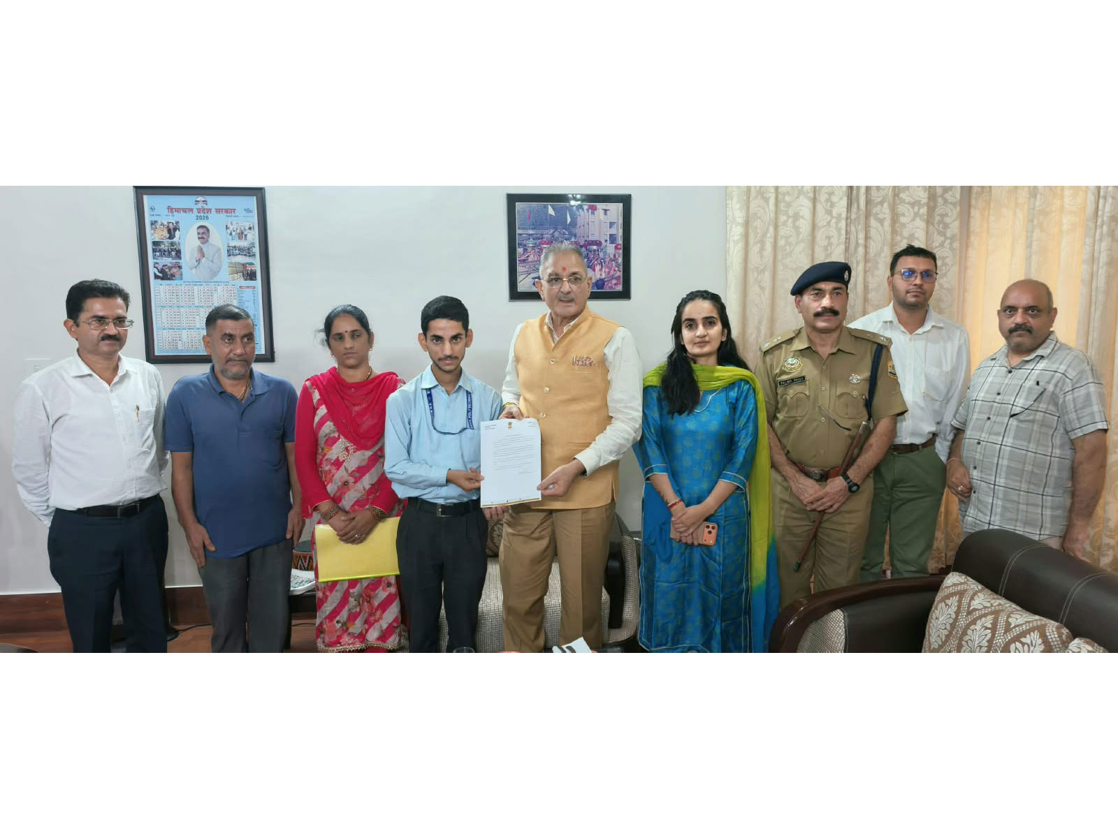 HP Governor Kavinder Gupta felicitated Sarvesh Sharma (Photo/ANI)