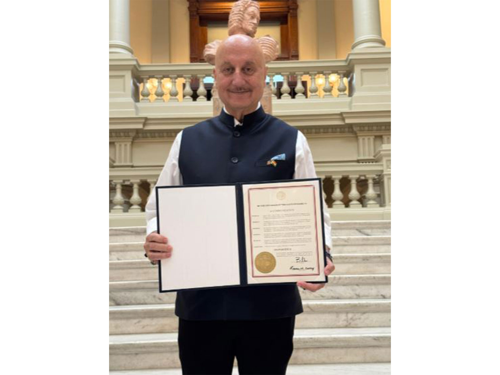 Anupam Kher with his commendation from Georgia Governor (Photo/X@AnupamPKher)