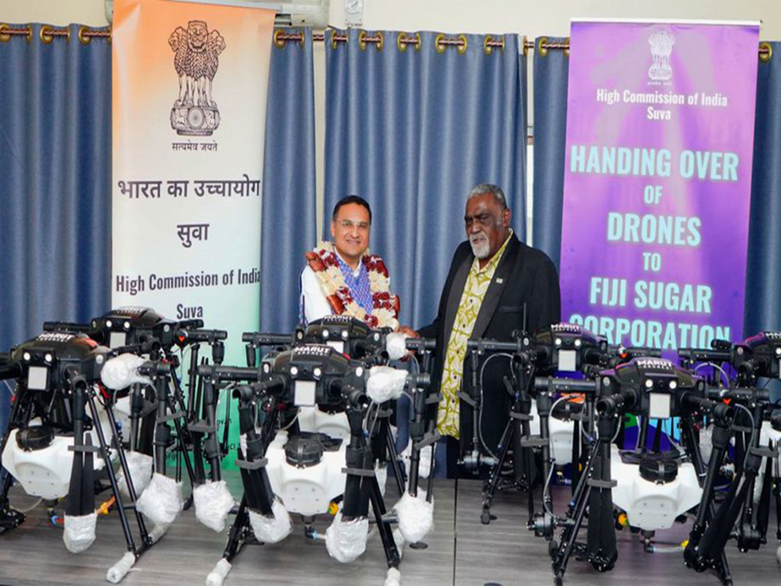 India's High Commissioner to Fiji, Suneet Mehta, and Fiji's Minister for Agriculture, Waterways and Sugar Industry, Tomasi Tunabuna, during the handover of 12 agricultural drones to the Fiji Sugar Corporation in Lautoka. (Photo: X/@HCI_Suva)