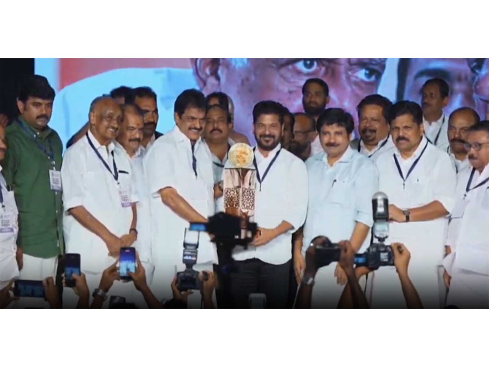 Telangana CM Revanth Reddy recieving award from MP Alappuzha KC Venugopal (Photo/ANI)