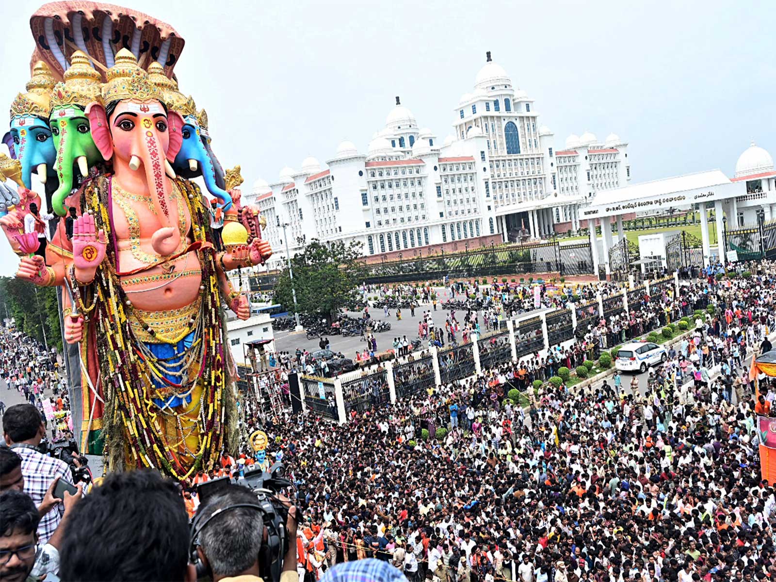 Devotees escort the 69-foot-tall Khairatabad Lord Ganesh idol towards Hussain Sagar Lake for immersion in Hyderabad (File Photo: ANI)