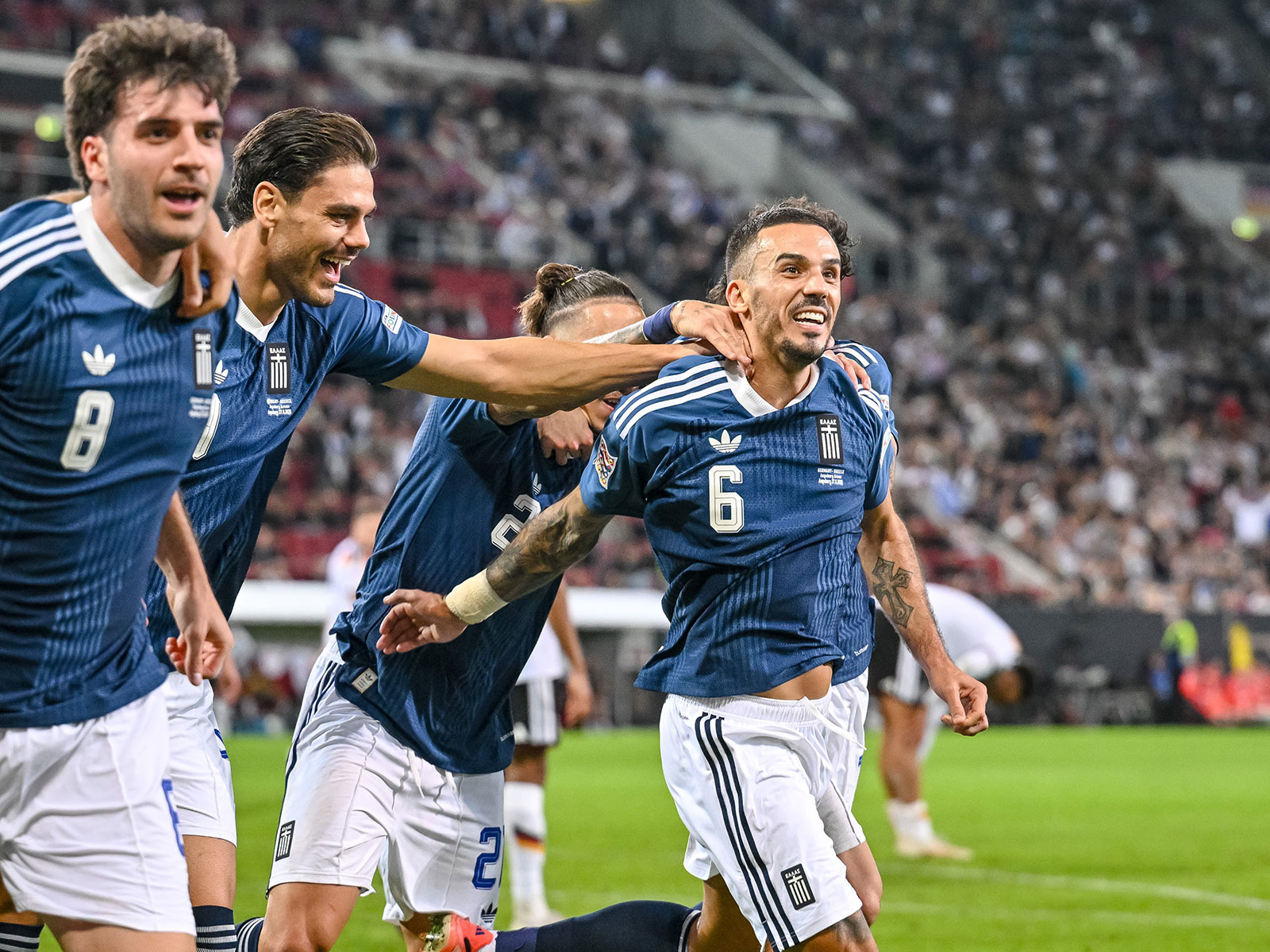 Greece football team's players celebrating a goal against Germany in UEFA Nations League. (Photo: X/ @UEFAEURO)