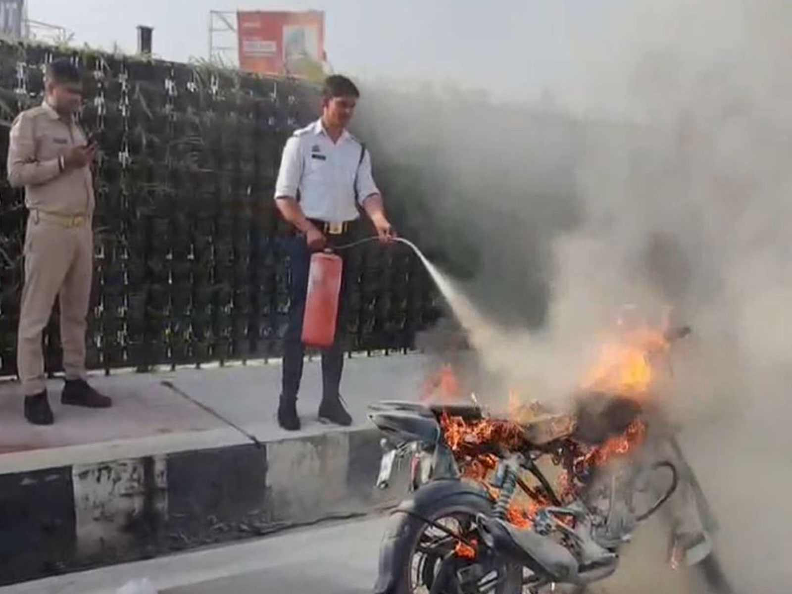 Motorcycle caught fire near 1050 Chauraha in Lucknow (Photo/ANI)