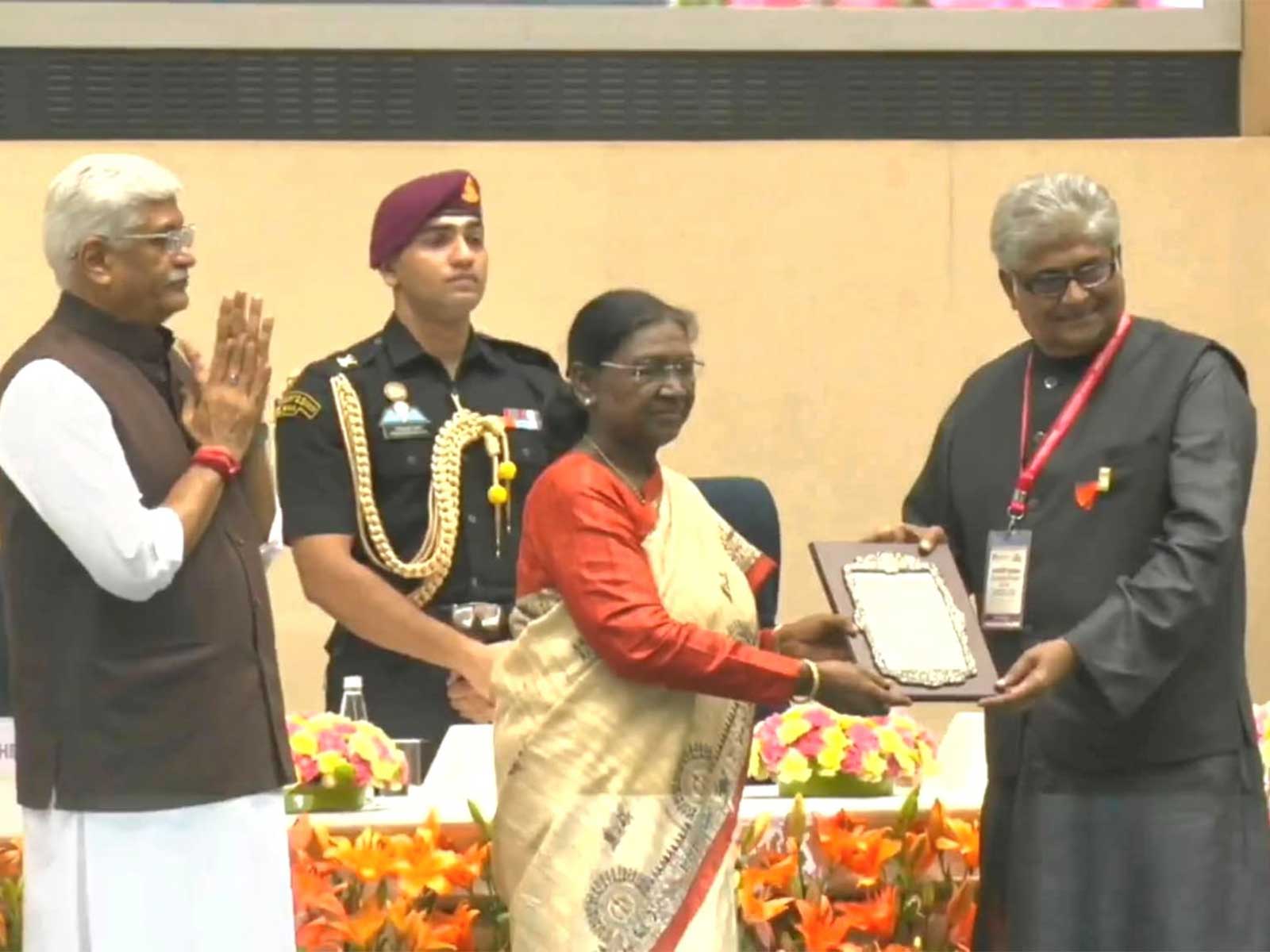 Illuminating the stage with brilliance, 'Magician of Light' Dinesh Kumar Poddar receives the Sangeet Natak Akademi Award from the President of India