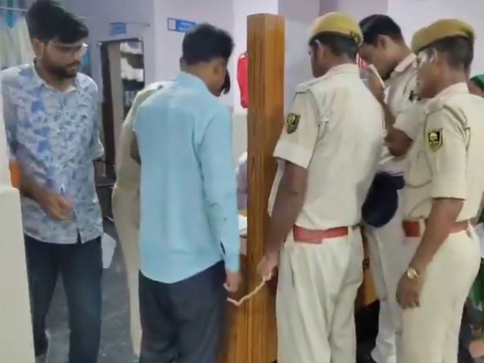 Police brought the prime accused, Rohit Kumar, and his brother-in-law, Vikram Kumar Sahni, in the case involving the rape of a woman at a hotel for a medical examination. (Photo/ ANI)