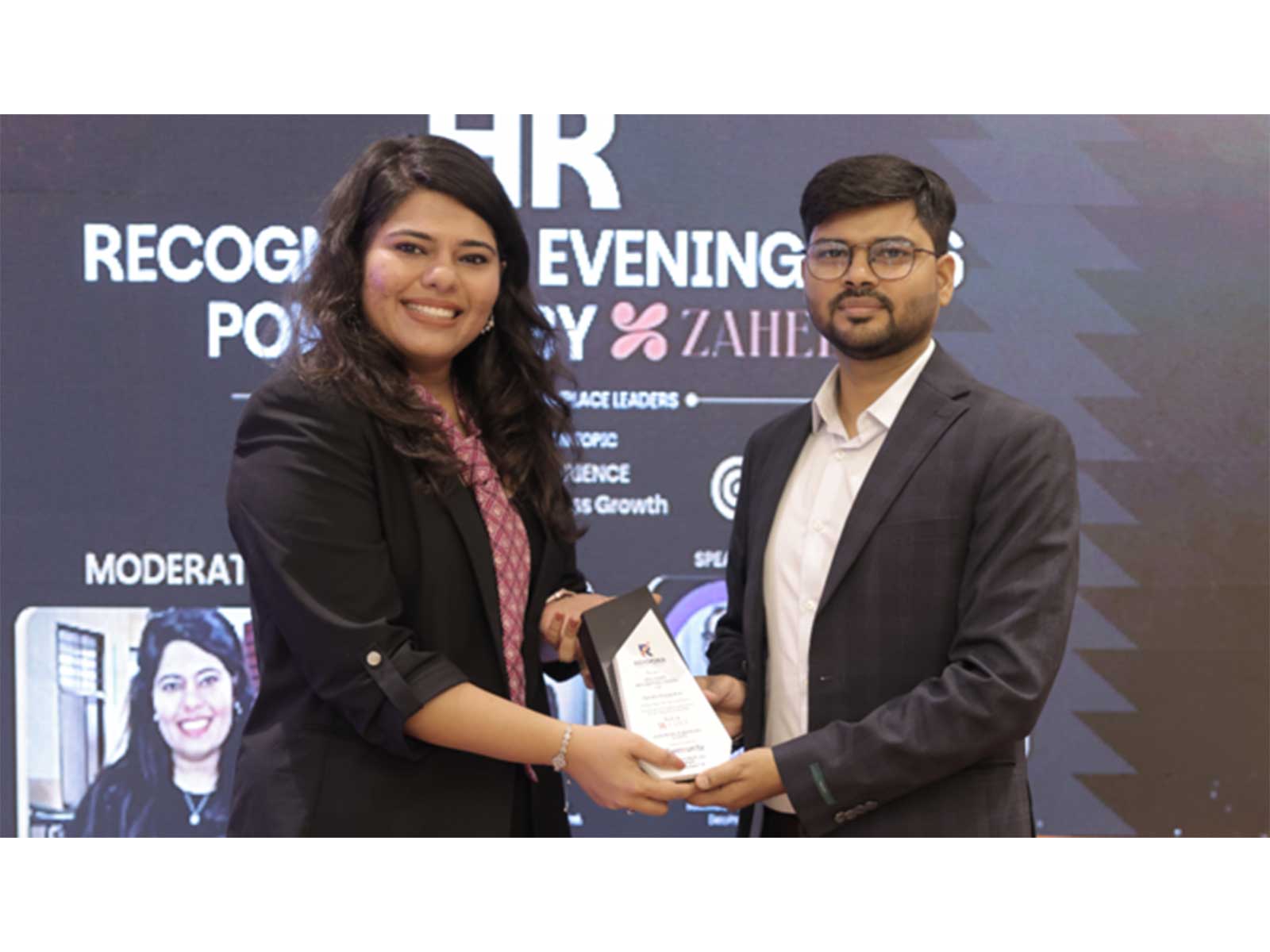 In pic: Ashish Gupta, Founder and CEO: Zahee (on the right), presenting the awards to Meenakshi M (On the left)