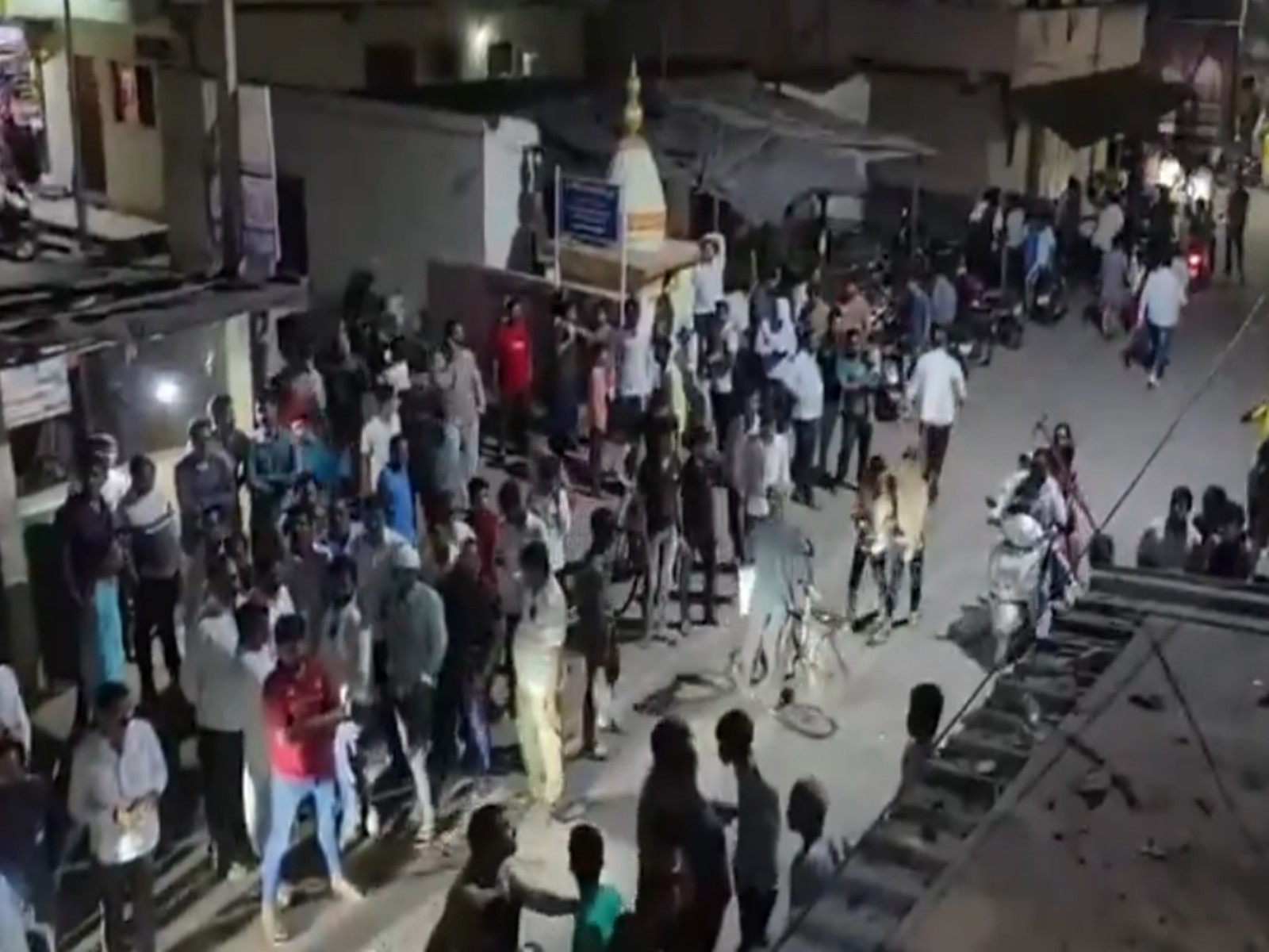 Locals gather outside Winners Academy (Photo/ANI)