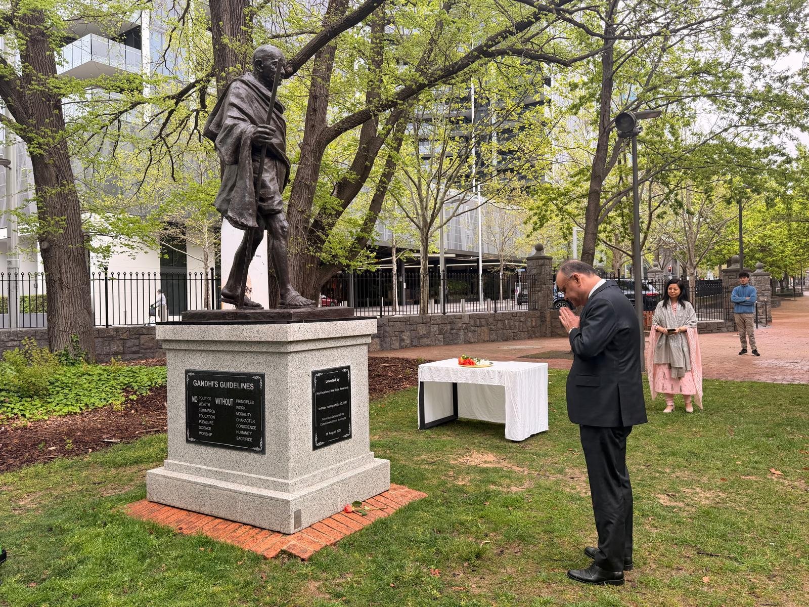 High Commissioner of India to Australia, Nagesh Singh, pays floral tributes to Mahatma Gandhi at the Mahatma Gandhi Statue in Glebe Park, Canberra, on Friday, marking Gandhi Jayanti. (Photo: X/@HCICanberra)